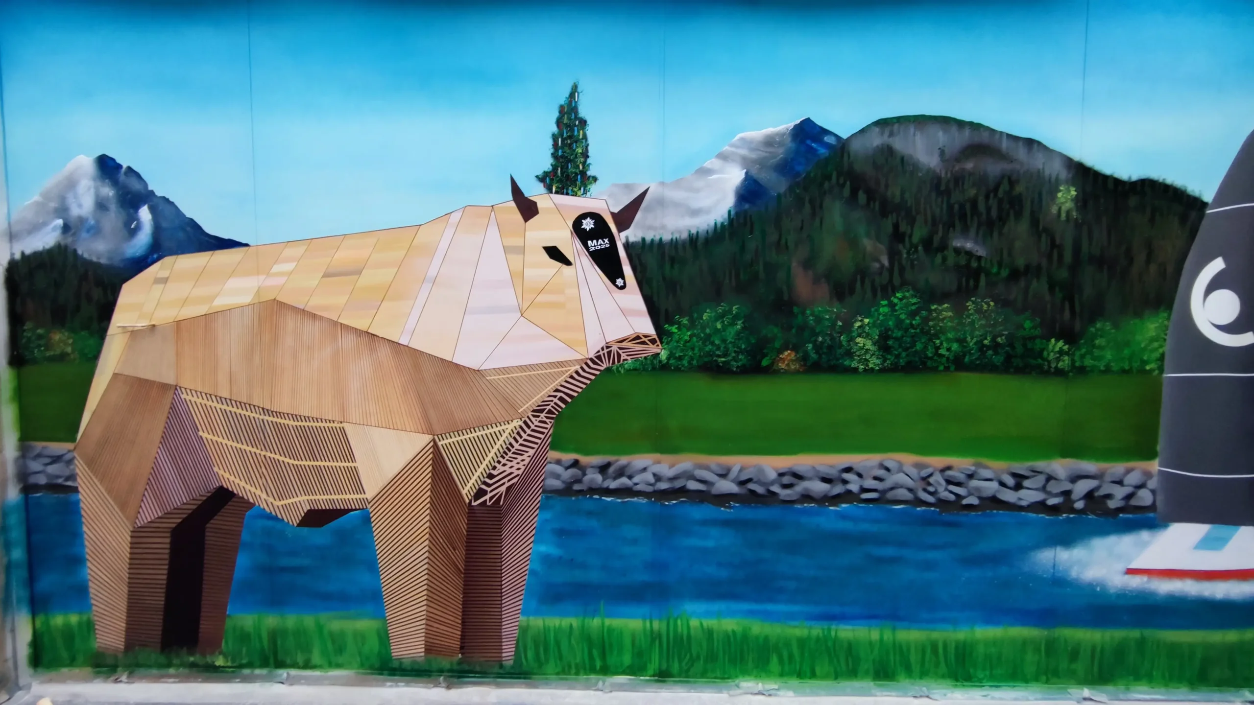 Max vom ESAF 2025 mit Linth und Alpen, Auftrags Wandbild in Mollis von Patrick Artho, Graffiti-Künstler aus Zürich, Schweiz